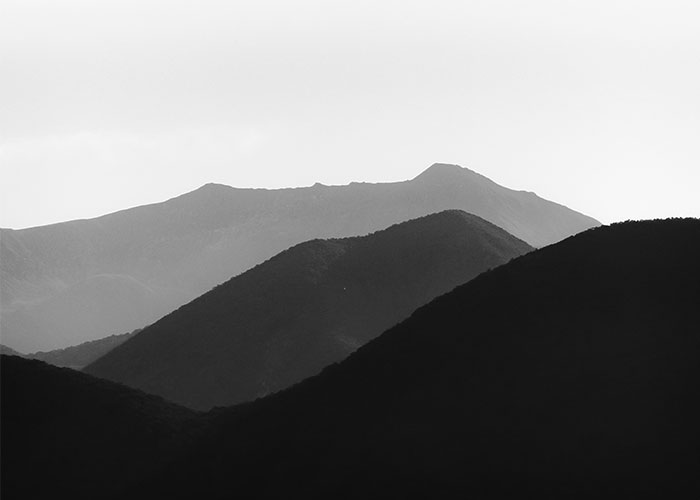 Three black and white mountains